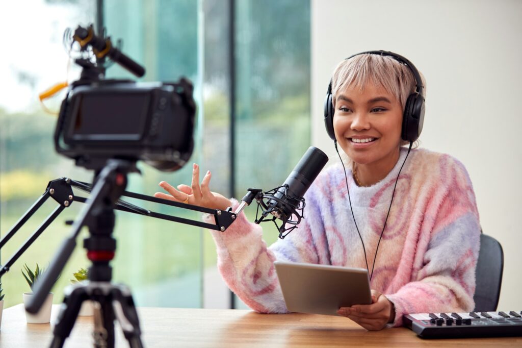 Female Vlogger Recording Music Keyboard Tutorial Video At Home With Camera